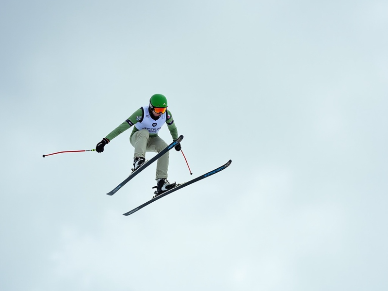Freepik A Ski Jumper In A White And Green Suit Is Captured 34630